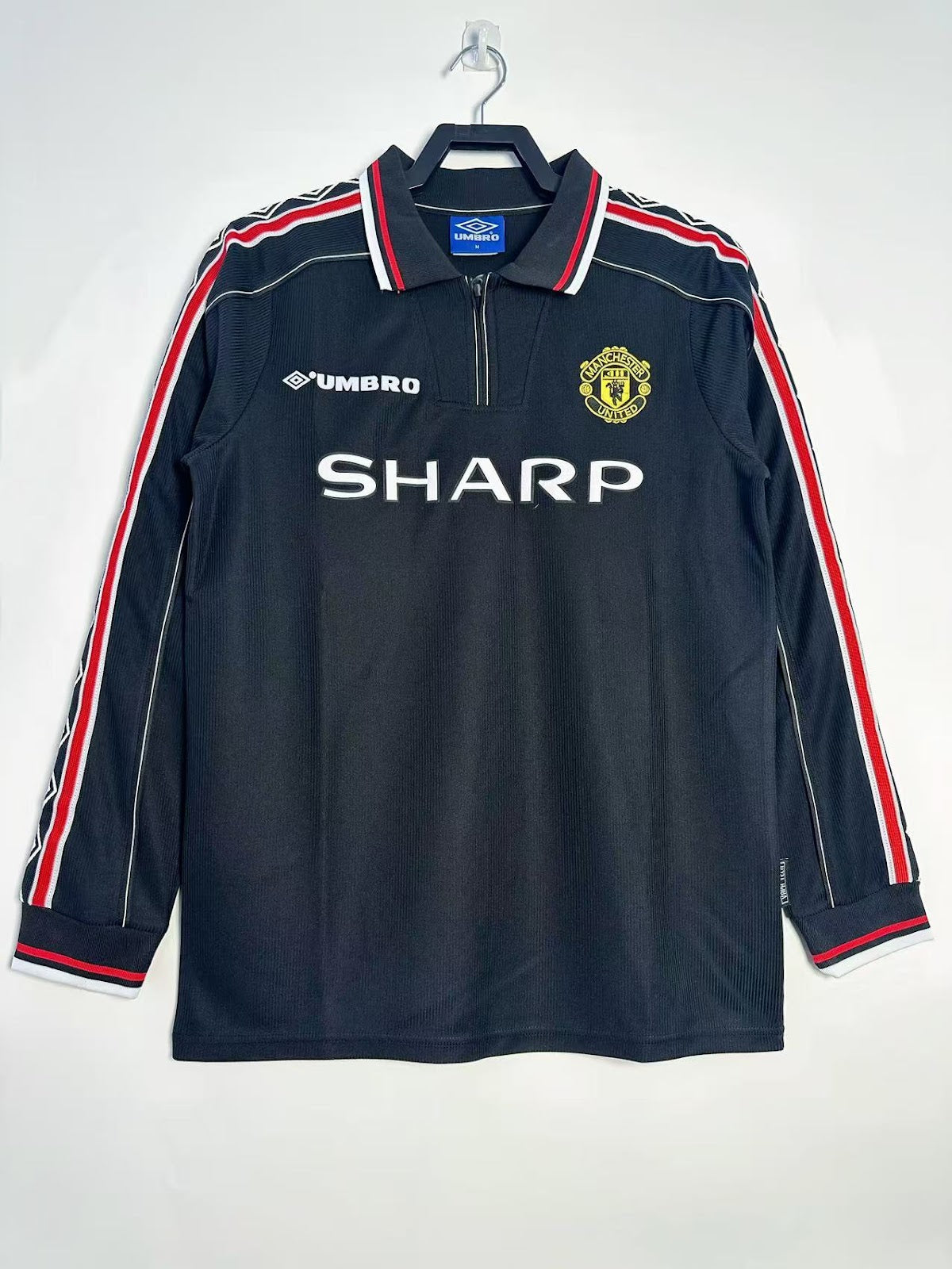 manchester united 1998-99 manga larga